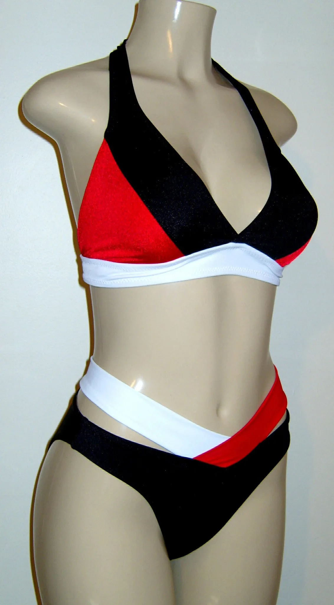 Halter bikini top and high waisted strappy bikini bottom